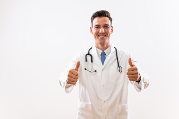 Wall Mural - Portrait of young  content doctor showing thumbs up.