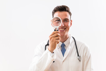 Wall Mural - Image of  doctor looking   through loupe .