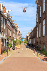 Wall Mural - Amsterdam, Netherlands - June 30, 2019: The historic city center of Amsterdam in the morning. Eerste Weteringdwarsstraat