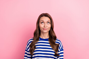 Wall Mural - Photo of young satisfied woman wear trendy sailor style shirt looking minded empty space discount store isolated on pink color background