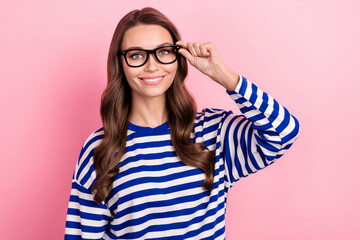 Wall Mural - Photo of young business lady wear striped blue shirt touch eyeglasses experienced financial topic isolated on pink color background