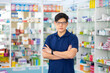 © NVB Stocker - Pharmacy Drugstore. Portrait handsome man buy medicine at pharma store. Health and wellness center