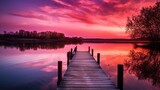 Fototapeta Pomosty - A beautiful pink sunset on a lake