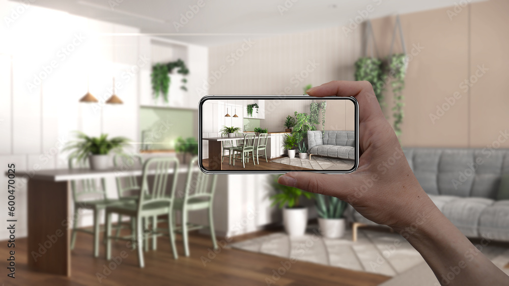 Hand holding smart phone, AR application, simulate furniture and ...