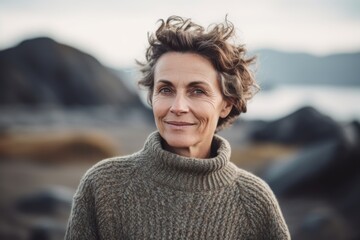 Sticker - Group portrait photography of a pleased woman in her 50s wearing a cozy sweater against a nordic or scandinavian landscape background. Generative AI