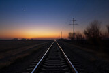 Fototapeta  - Railway track at night dawn. AI Generated