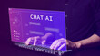 Chat with AI or Artificial Intelligence technology. Man using a laptop computer chatting with an intelligent artificial intelligence asks for the answers he wants. Smart assistant futuristic, ChatGPT