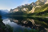 Fototapeta Góry - View of Gossausee. Reflection of the mountains in the lake. Austria, Europe.