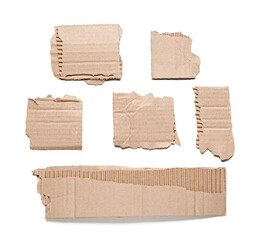 Torn pieces of cardboard isolated on white background