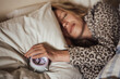© Konstiantyn Zap - circadian rhythm, sleeping woman and alarm clock.