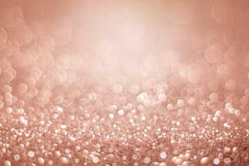 rose gold abstract bokeh texture with heart shape background.