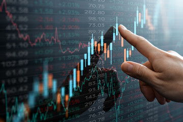 Data of stock market.  Financial analyst pointing candlestick chart.