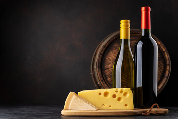 Wall Mural - Various cheese on board, red and white wine