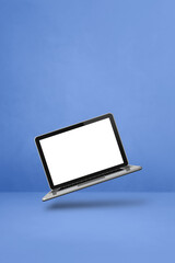 Sticker - Floating computer laptop isolated on blue. Vertical background