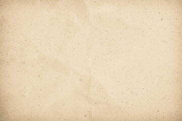 Brown recycled craft paper texture as background. Cream paper texture, Old vintage page or grunge vignette. Pattern rough art creased grunge letter. Hardboard with copy space for text.
