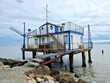 Fishing shack or fishing hut or fishing cabin on pier of Adriatic sea in Italy, Europe