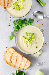 Wall Mural - Leek Soup, Comfort Meal, Potato and Leek Creamy Soup, Vegetarian Food on Bright Background