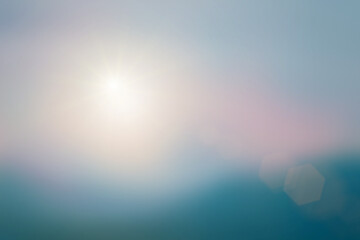 Wall Mural - Abstract bokeh flare sunlight with blur green, peace and yellow colours nature sunrise beach and mountains background