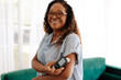 Senior woman using a flash glucose monitor to manage her diabetes at home