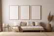 © Iryna - Neutral beige wall with three empty frames set for wall art mockup. Monochrome boho room with minimalist vase sofa and neutral decor. Generative AI.