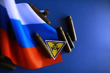 Wall Mural - Russian flag and bullet casings on the table. Background concept Russian army.