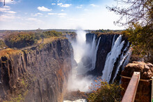 The Spectacular Victorial Falls Plunge Into A Gorge Separating Zimbawbwe (left) And Zambia