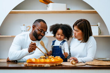 Happy family spending time and having activities together at home