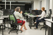 © Михаил Решетников - Four office workers are talking during a break.