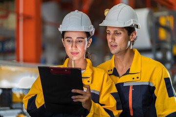 Wall Mural - A new generation of engineers in a metal sheet factory. Studying work methods from supervisors or colleagues and studying by yourself be taught professionally