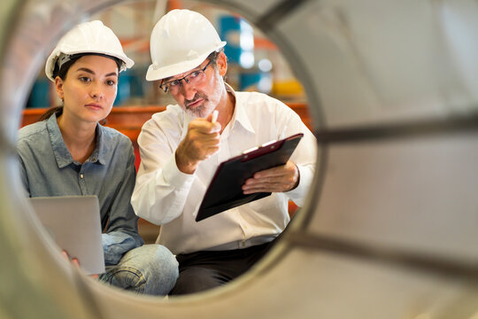 A new generation of engineers in a metal sheet factory. Studying work methods from supervisors or colleagues and studying by yourself be taught professionally