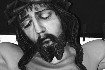 Wall Mural - Close up ancient statue of Jesus Christ