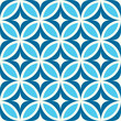 Mid century modern starbursts on blue and turquoise circle leaves seamless pattern. For home décor, retro backgrounds and wallpaper	