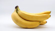 © GIUSEPPE - close-up of a bunch of ripe bananas on a white background