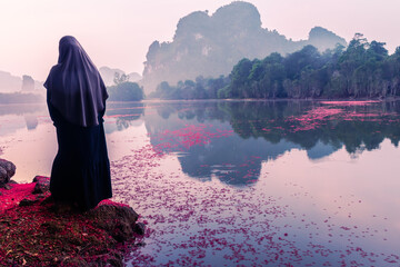 Wall Mural - Landscape Nature View of Nong Thale Lake and islamic woman or muslim in Krabi Thailand