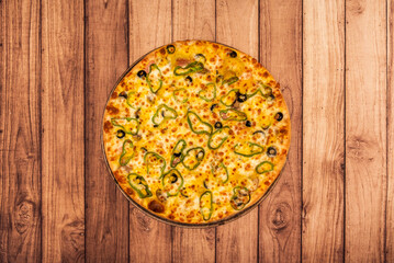 Wall Mural - A great pizza with peppers, olives and cheese