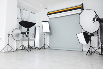 Canvas Print - Interior of modern photo studio with professional lighting equipment