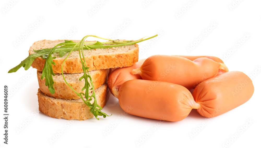 Tasty boiled sausages with arugula and bread on white background