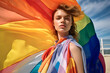 © Ricky - model wearing rainbow flag dress billowing in the wind at sunny beach, summer fashion editorial made with generative ai