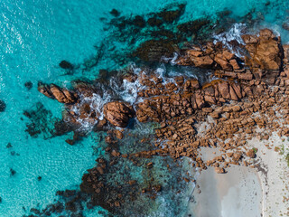 Wall Mural - Aerial top down view of beach and clear blue water. Ocean waves on the beach as a background. Beautiful natural summer vacation holidays background. Eagle Bay, Western Australia. Coastal seascapes