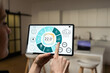 © Angelov - Woman at home using smart screen, automation domestic system