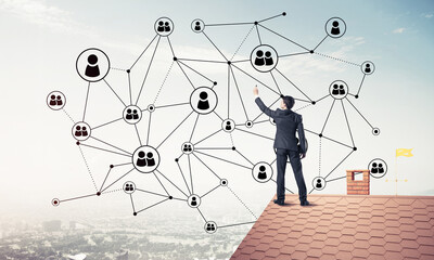 businessman on house roof presenting networking and connection c