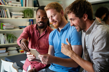 Sticker - Group of happy startup business people having fun and chatting at workplace office