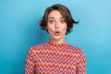 Photo Portrait Of Attractive Young Woman Impressed Stare Plump Lips Dressed Stylish Striped Clothes Isolated On Blue Color Background