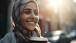 A young happy smiling young woman, an Arab woman with a cup of coffee in her hand, walks through the city at the golden hour. Photo generated by AI