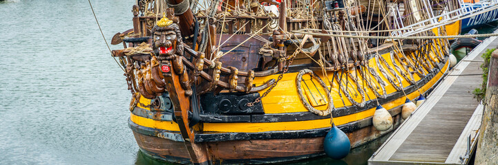 Wall Mural - Bow of the Shtandart ship, a replica of an 18th century Russian frigate in the Port of La Rochelle, France 