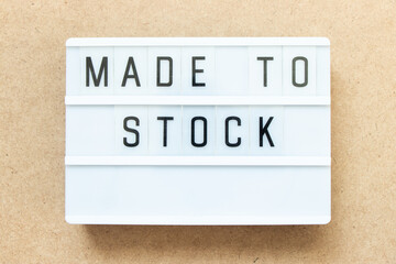 Canvas Print - Lightbox with word made to stock on wood background