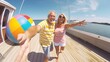 Happy couple on houseboat patio with beach ball