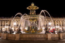 Fountain Of The Seas Located In Place De La Concorde In Central Paris, France, At Night - Motion Blur Achieved With Long Exposure On A Fountain With Many Golden Statues Of Greek Gods