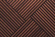 A Wall Of Wooden Slats In The Color Of Dark Wood With A Pattern Of Wall Panels In The Background
