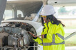 © reewungjunerr - Technician fixing the engine of the airplane,Female aerospace engineering checking aircraft engines,Asian mechanic maintenance inspects plane engine